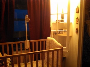 To the right of the crib, the small squares hanging in a vertical line will be detailed in the following photos